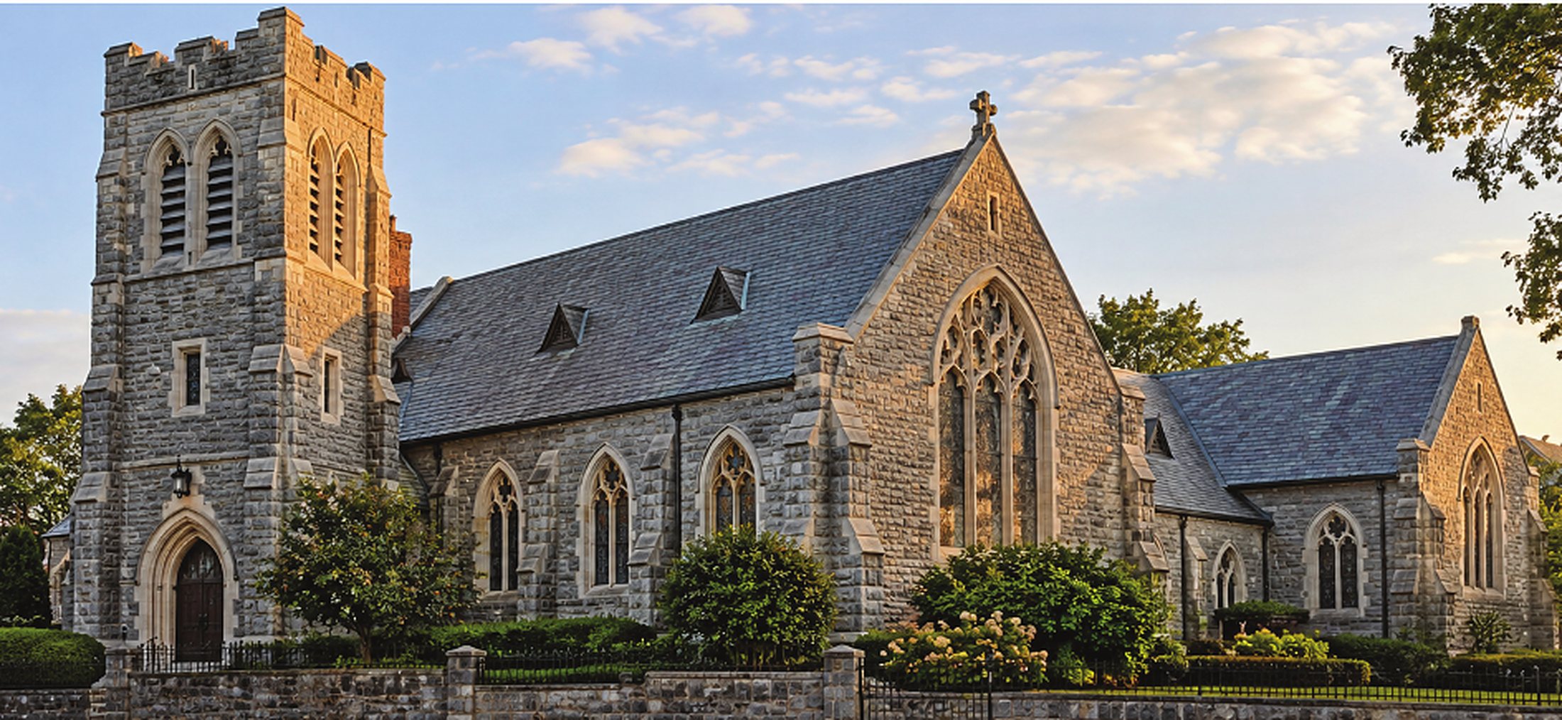 Historic stone church at sunset